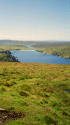 Burra Firth, Unst, viewed from Saxa Vord, with Ronas Hill in the distance.